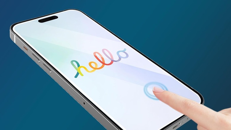An iPhone with a tempered glass screen protector being applied.