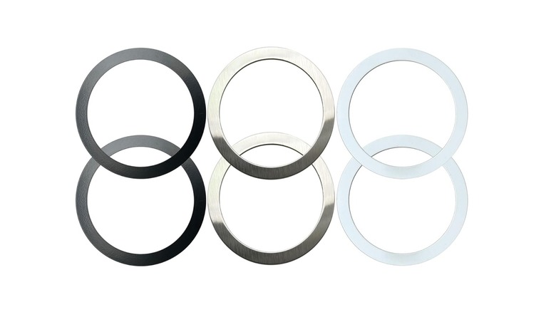 A set of several thin, circular Aothey MagSafe-compatible metal rings in different colors.