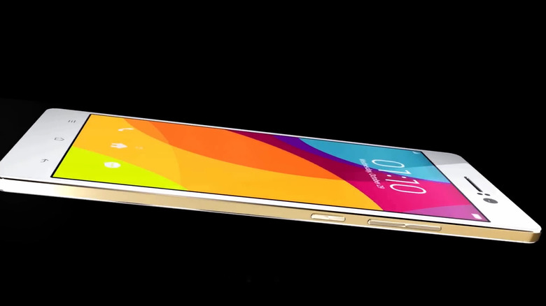 Side profile view of the Oppo R5, showcasing its metallic frame and the lack of a traditional headphone jack due to its 4.85mm thickness.