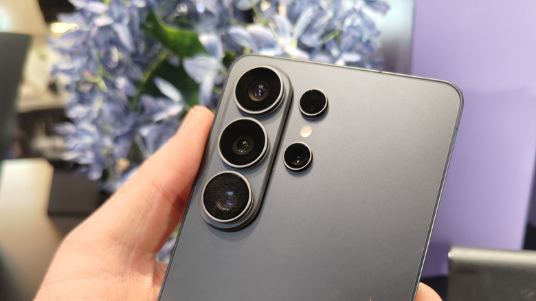 Macro shot of the rear camera lenses on the black Samsung Galaxy S26 Ultra.