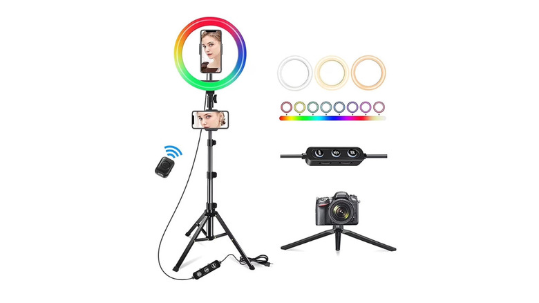 A selfie ring light mounted on a tripod with RGB lighting options.