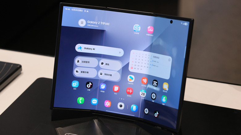 Samsung Galaxy Z TriFold smartphone unfolding to show its massive multi-panel display.
