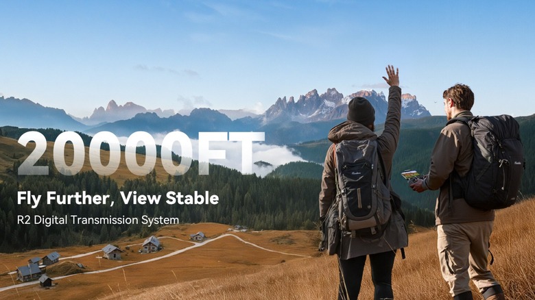 Two hikers standing on a mountain ridge using the Ruko U11MINI 4K drone.
