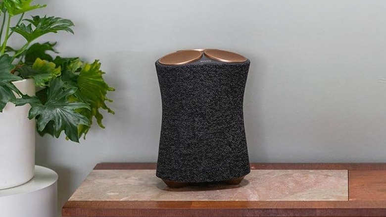 A Sony SRS-RA5000 Bluetooth speaker sitting on a table in a home setting.