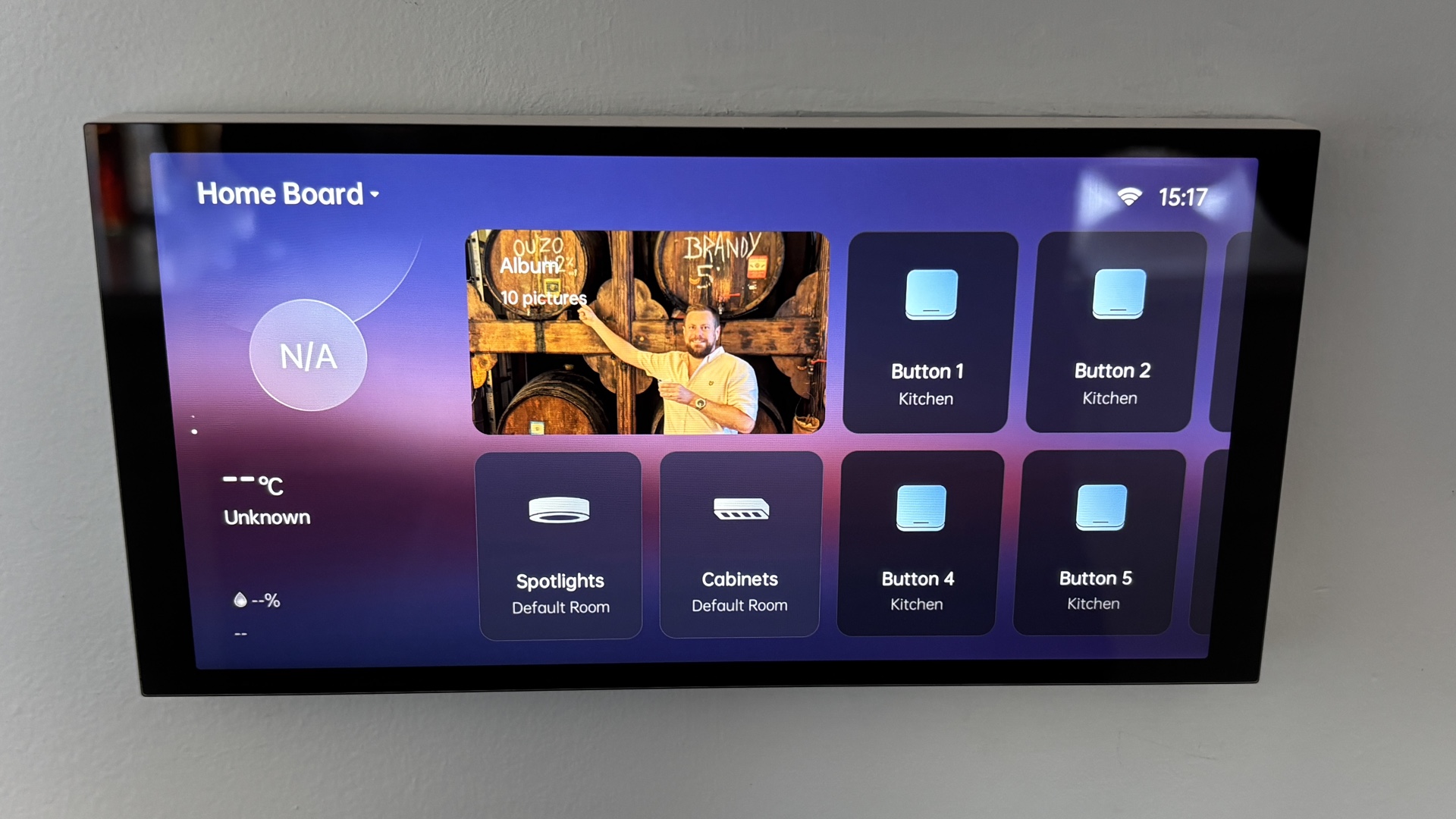 Close-up of the Aqara Hub S1 Plus touchscreen showing the smart home dashboard interface.