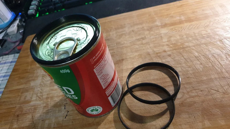 Canned goods organized and held together by 3D printed circular stacking rings.