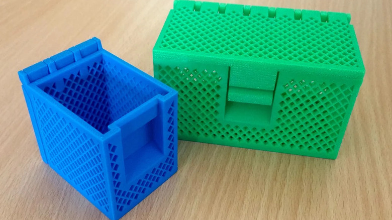 Two 3D printed storage boxes with durable hinged lids for organizing small hardware.