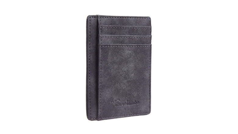 A thin gray leather wallet with the Travelambo brand name on the front.