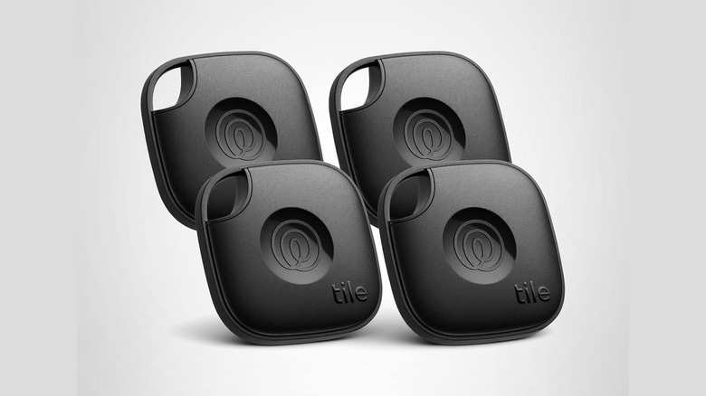 A set of four Tile by Life360 Bluetooth trackers.