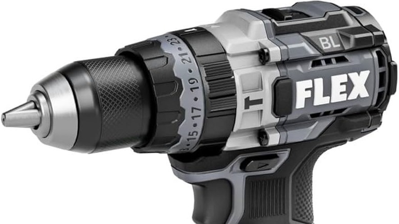 Close-up view of a Flex brushless hammer drill focusing on the chuck and motor housing.