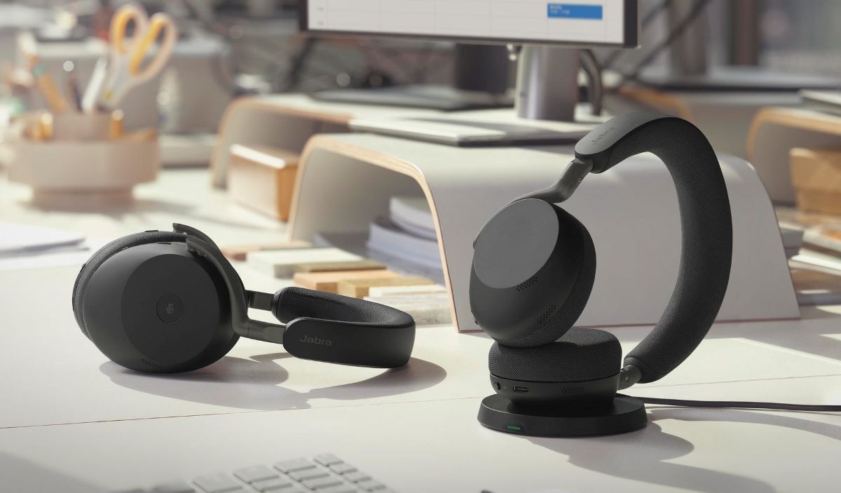 Close-up of the Jabra Evolve3 85 earcups showing the integrated microphone array and breathable fabric.