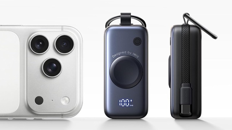 Close-up of the IMIU SnapGo mini charger with its digital battery indicator and integrated charging cable.