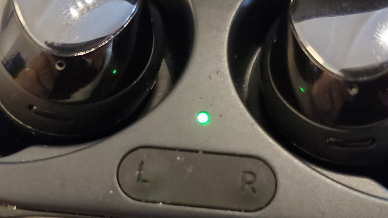 Close-up of the LED status indicator light on a Samsung Galaxy Buds charging case.