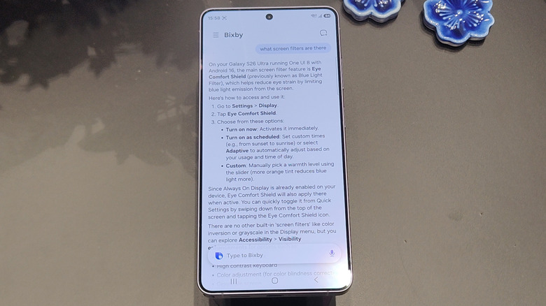 The Galaxy S26 Ultra showing a Bixby search that suggests specific settings menu actions.
