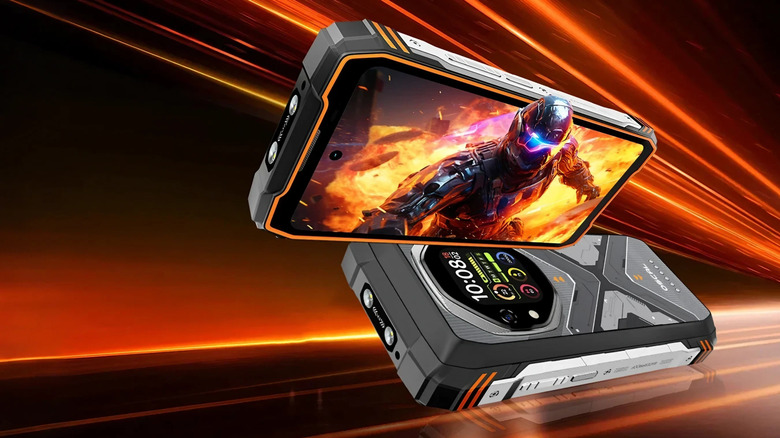 CG promotional shot of the Oscal Tank 1 showing both the screen and the rugged back panel with orange accents.