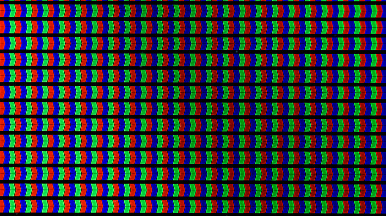 Macro view of red, green, and blue subpixels on a digital display panel.