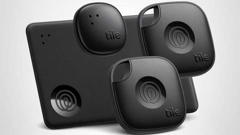 A collection of Tile Bluetooth trackers including the Slim, Mate, and Sticker models.