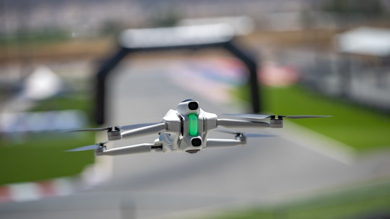 An aerial shot of the Antigravity A1 flying above the turns of a K1 Speed go-kart track.