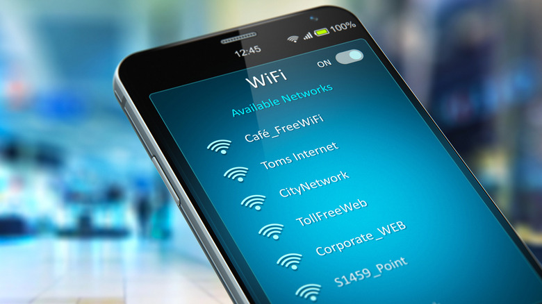 A list of available Wi-Fi network names (SSIDs) displayed on a mobile phone screen.