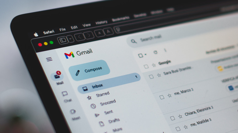 Gmail opened on a laptop sitting on a clean desk.
