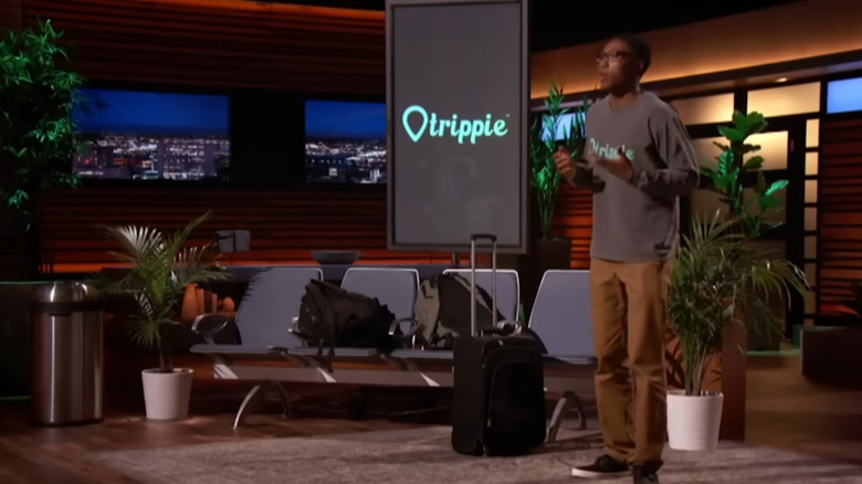 Ryan Diew presenting the Trippie app to the investors on the set of Shark Tank.