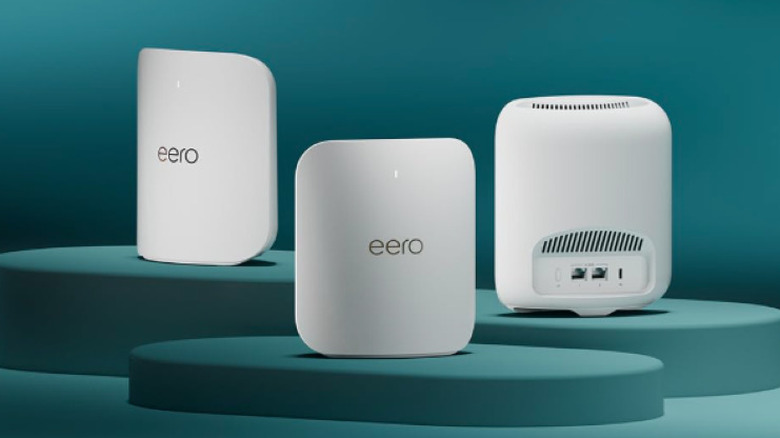 Three Eero Pro 7 units arranged together, highlighting the multi-node system.