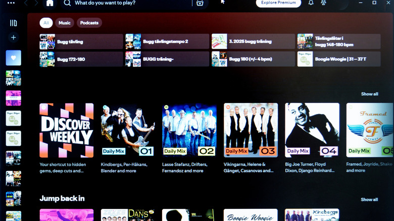 Display of various curated playlists and icons on the Spotify mobile app interface.