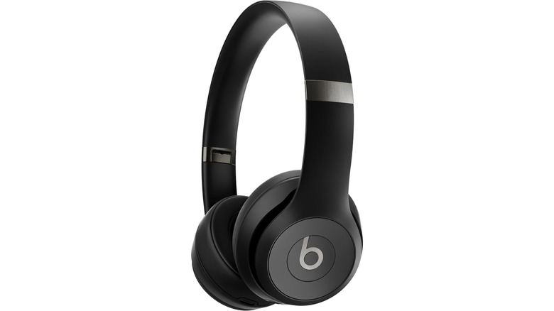 A pair of matte black Beats Solo 4 wireless Bluetooth headphones.
