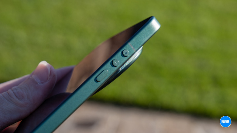 Macro shot of the side buttons and metal frame of the Xiaomi 17 Ultra.