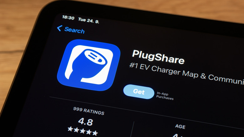 The PlugShare app listing in the Apple App Store showing its EV charging station locator features.