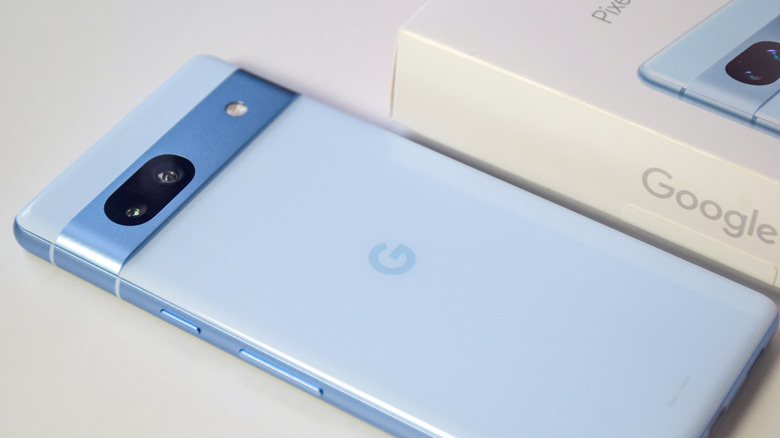 The back of a sea-blue Google Pixel 7a smartphone.