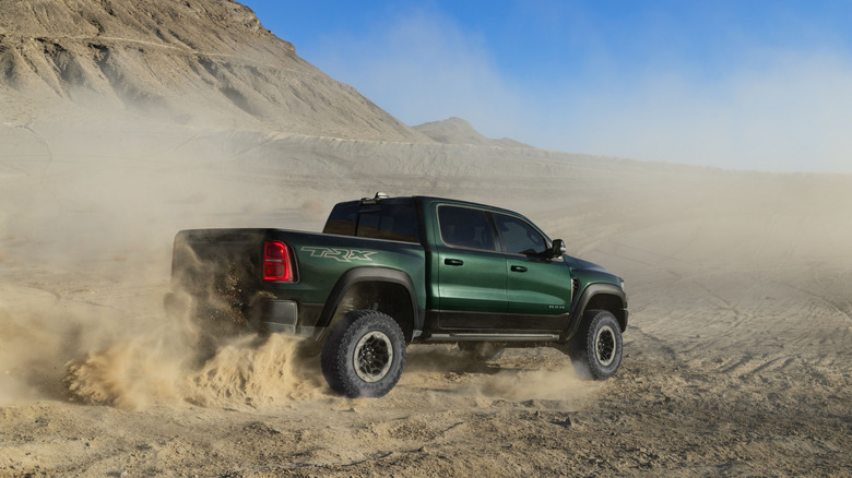 Rear view of the 2027 Ram 1500 SRT TRX highlighting its wide stance and dual exhaust.