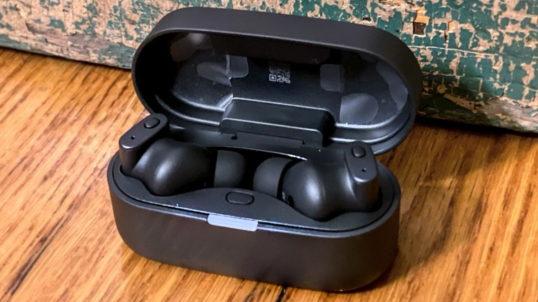 Close-up of the Status Pro X earbud sitting flush in a person's ear.