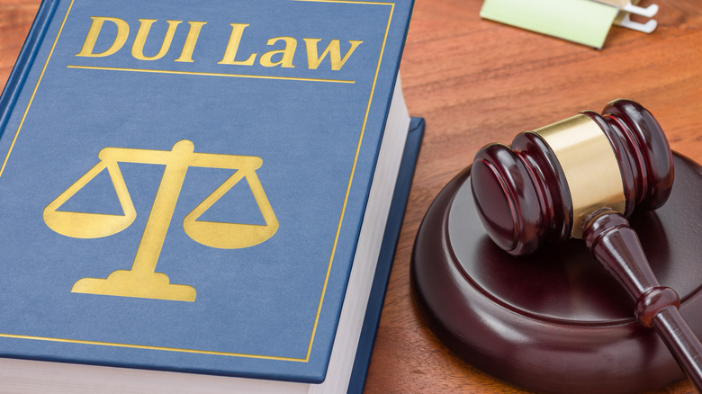A legal gavel resting on a law book, symbolizing the judiciary's role in DUI cases.