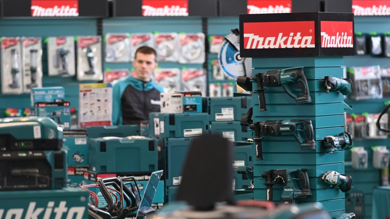 The Makita brand section at a retail hardware store showing various tools and accessories.