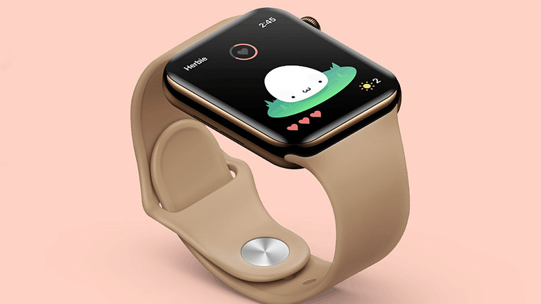 A close-up of an Apple Watch screen featuring the Nomi virtual pet interface.