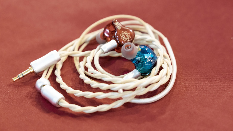Close-up of professional IEMs with silicone ear tips.